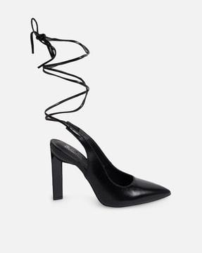 pointed-toe strappy pumps