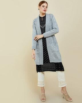pointelle-knit open-front shrug with patch pockets