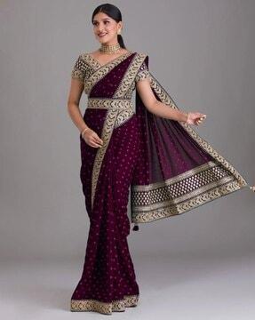 polka-dot print saree with contrast boarder