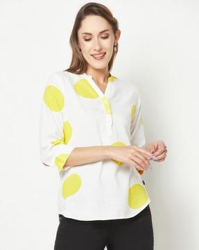 polka-dot print top with cuffed sleeves