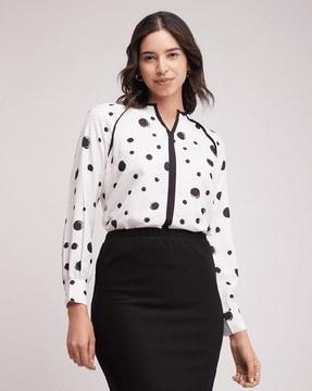 polka-dot print top with cuffed sleeves