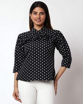 polka-dot printed top with cascade collar