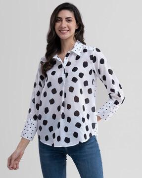 polka-dot top with cuffed sleeves