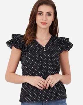 polka-dot top with ruffled sleeves