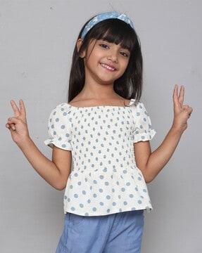 polka-dot top with smocked detail
