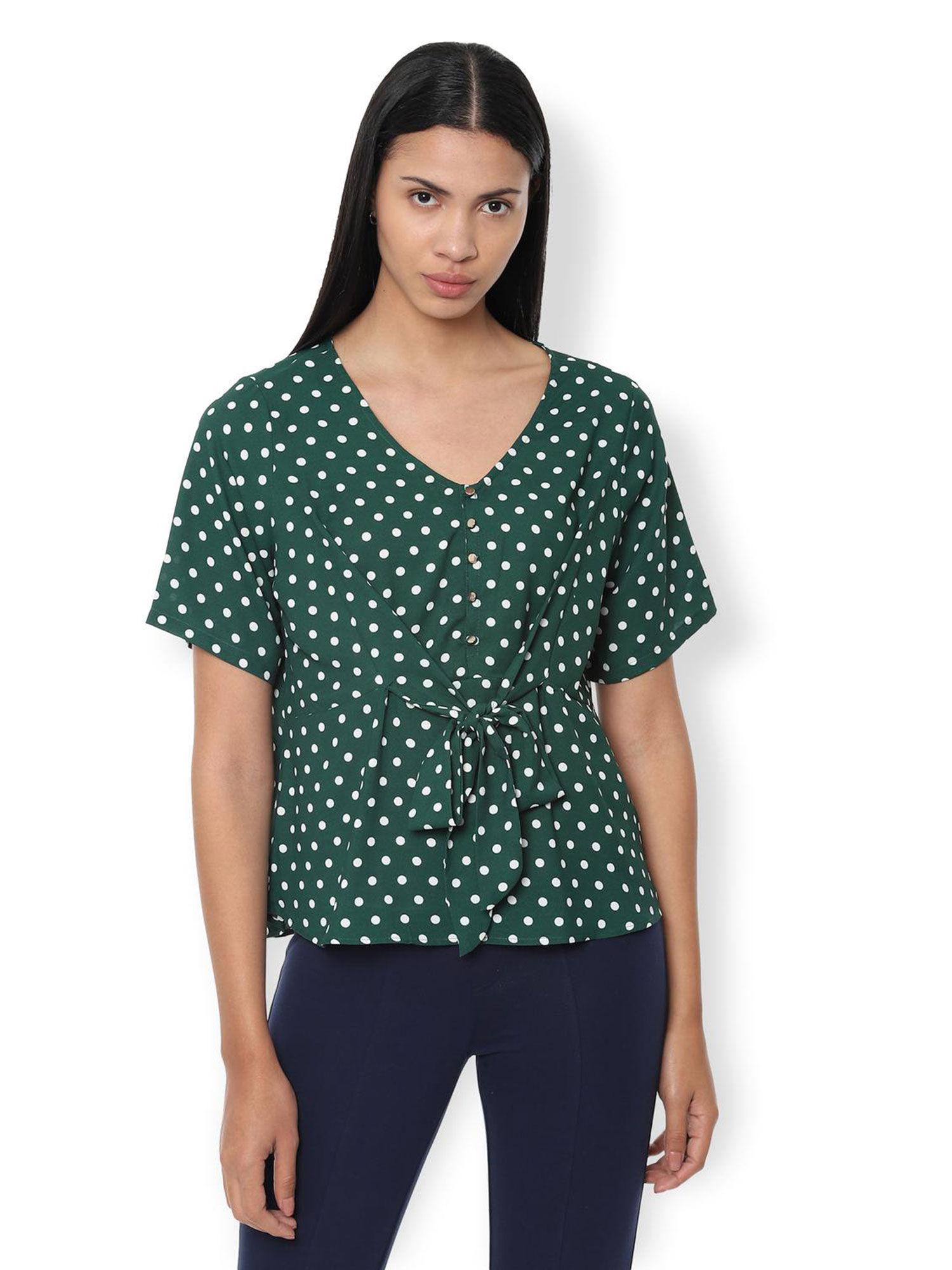 polka dots green top