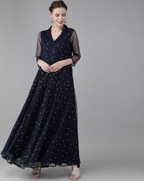 polka-dotted gown with shawl collar