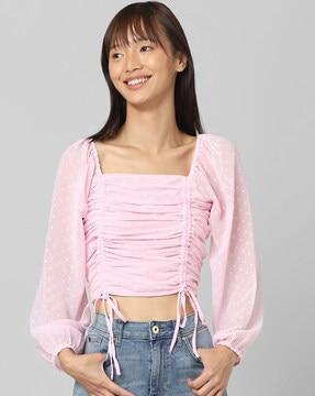 polka-dotted ruched crop top