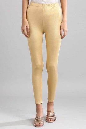 poly lycra woven womens tights - gold