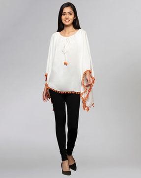 poncho with lace pom pom detail