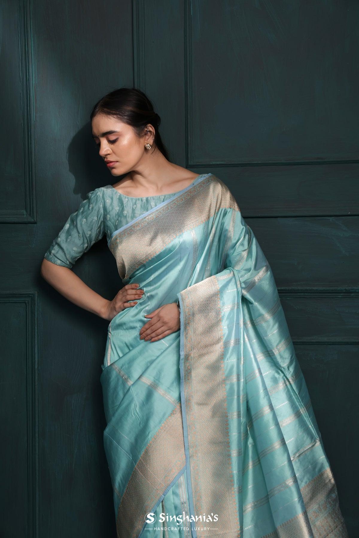 powder blue banarasi silk saree with stripes design
