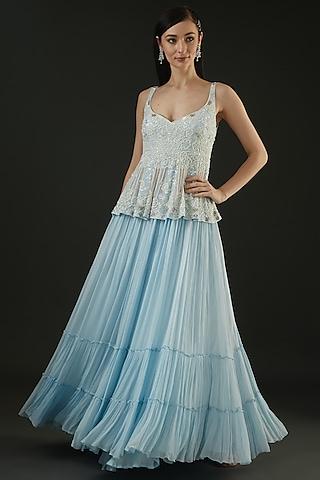 powder blue frilled gown with attached peplum