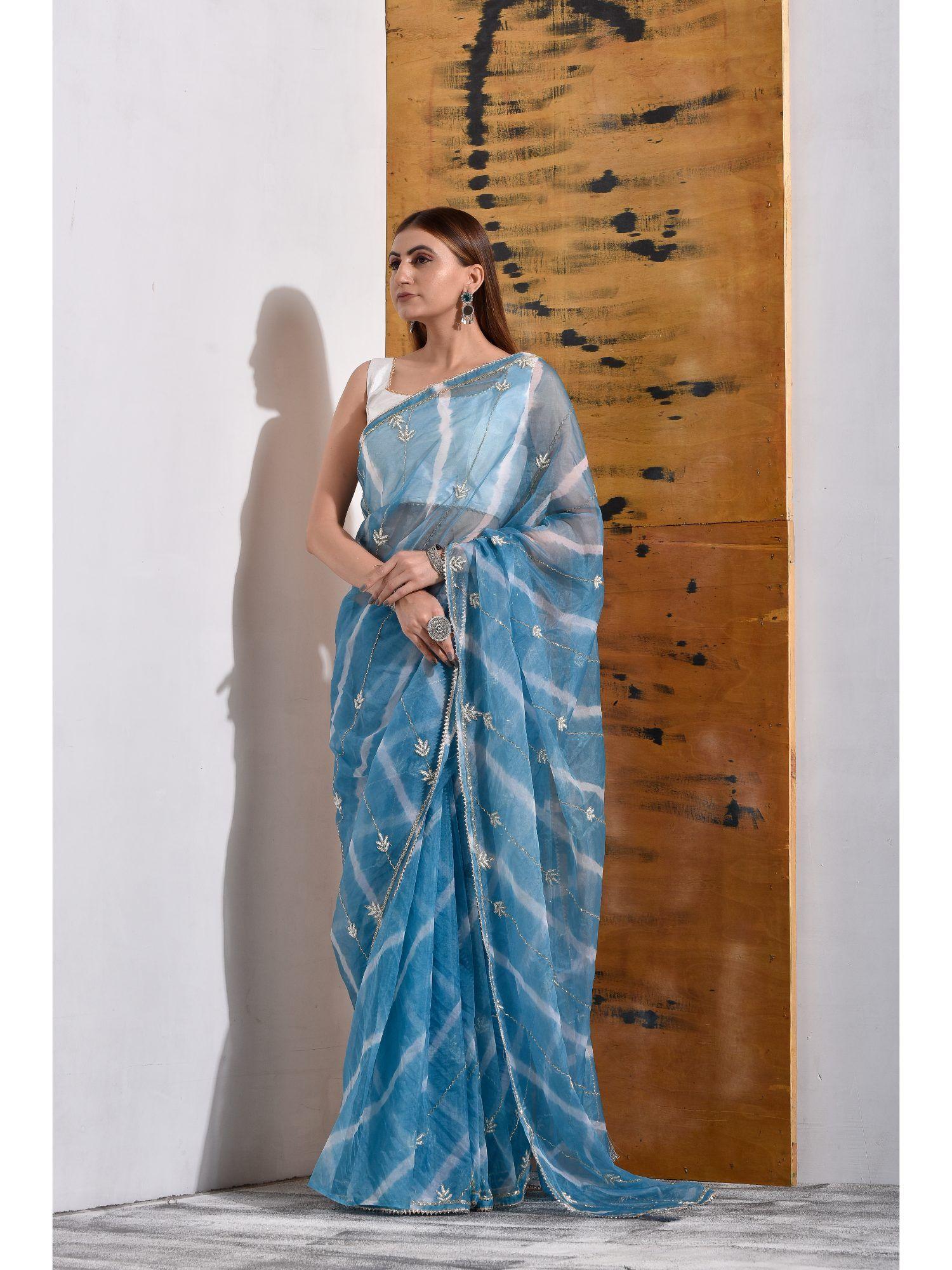 powder blue handcrafted organza tissue saree with unstitched blouse