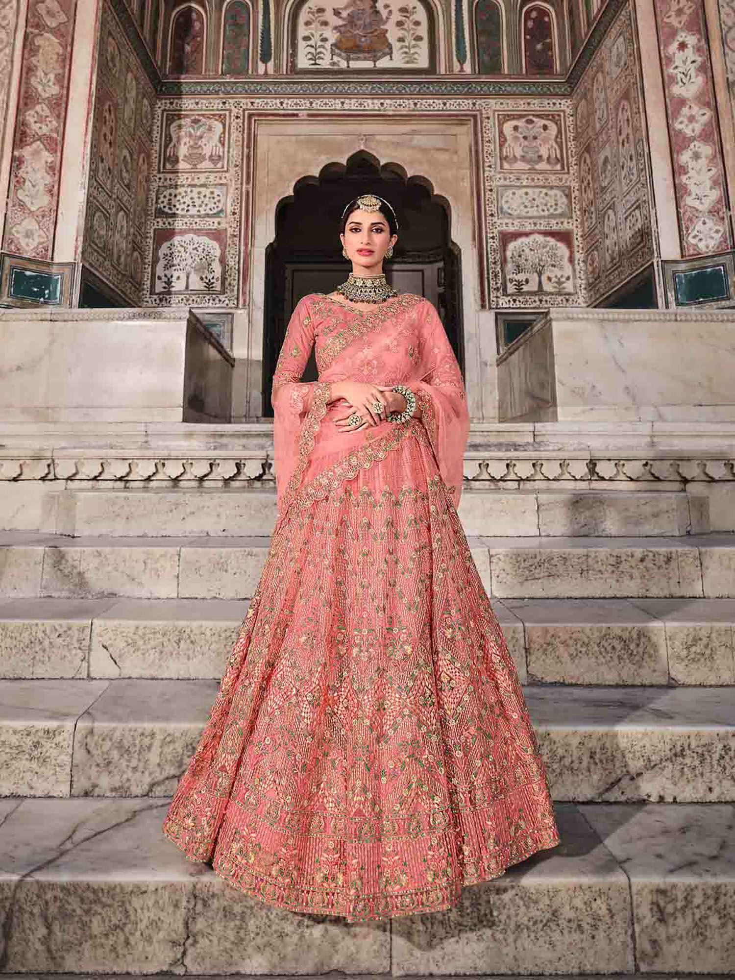 pretty peach soft net semi stitched lehenga with unstitched blouse (set of 3)