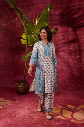 printed knee length silk woven women's kurta set - blue
