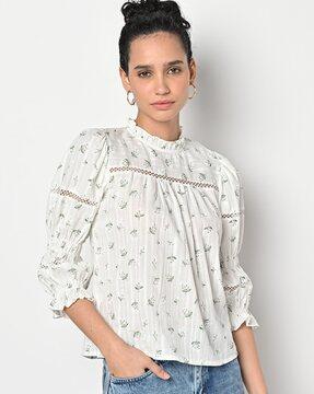 printed top with lace applique