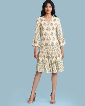 printed button-down tiered dress with notched band collar