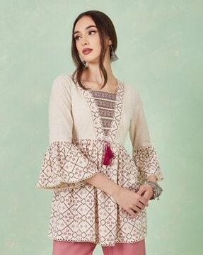 printed flared tunic with tassels