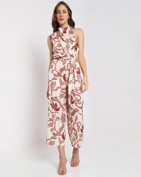 printed halter-neck jumpsuit with belt