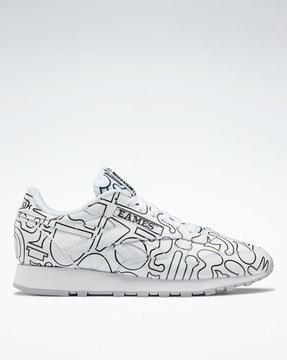 printed lace-up running shoes