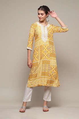 printed rayon round neck women's casual wear kurta - yellow