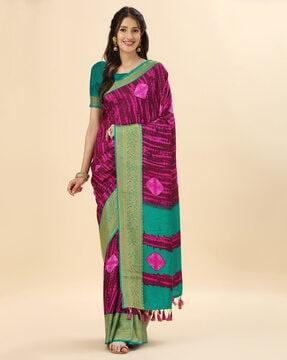 printed silk saree with contrast border & tassels