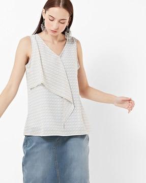 printed sleeveless top with panel overlay