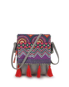 printed sling bag with tassels