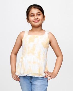 printed smocked peplum top with lace trim