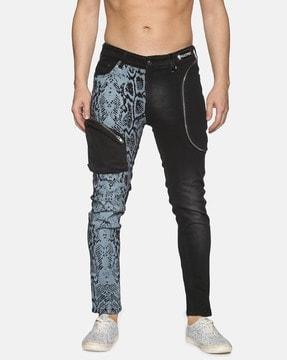 printed tapered jeans with zip pockets