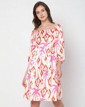 printed tiered dress with cuffed sleeves