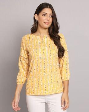 printed top with 3/4th sleeves