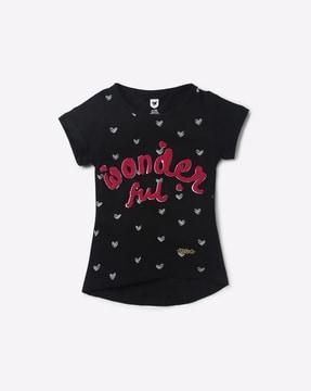 printed top with applique