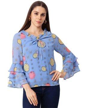 printed top with bell sleeves