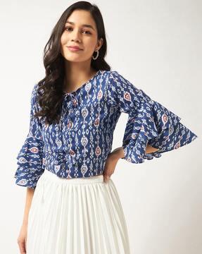 printed top with bell sleeves