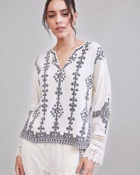 printed top with lace sleeves