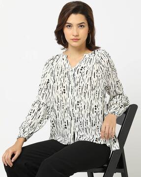 printed top with notched neckline