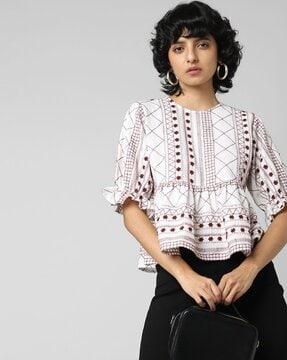 printed top with puff sleeves