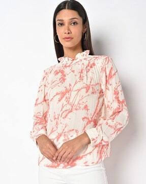printed top with ruffle accent