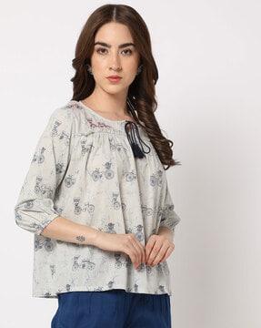 printed top with tie-up neckline