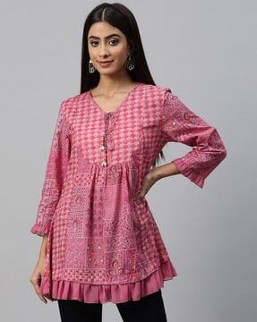 printed tunic with ruffle detail