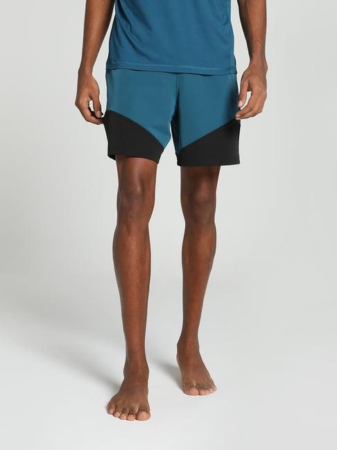 puma studio ultramove blue regular fit colour block shorts