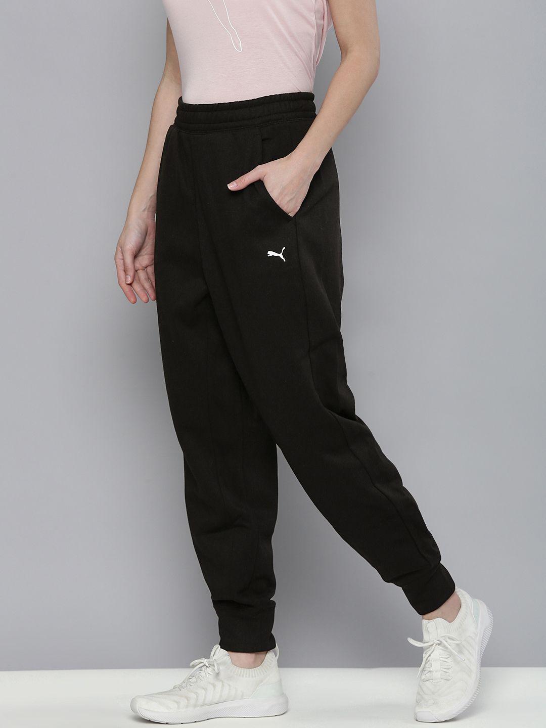 puma women black solid relaxed fit drycell train favourite fleece sweat joggers