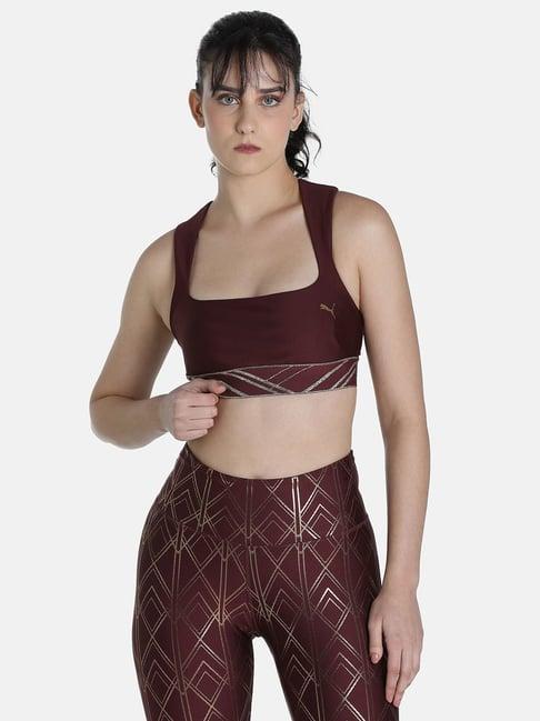 puma deco glam mid impact deco maroon print sports bra