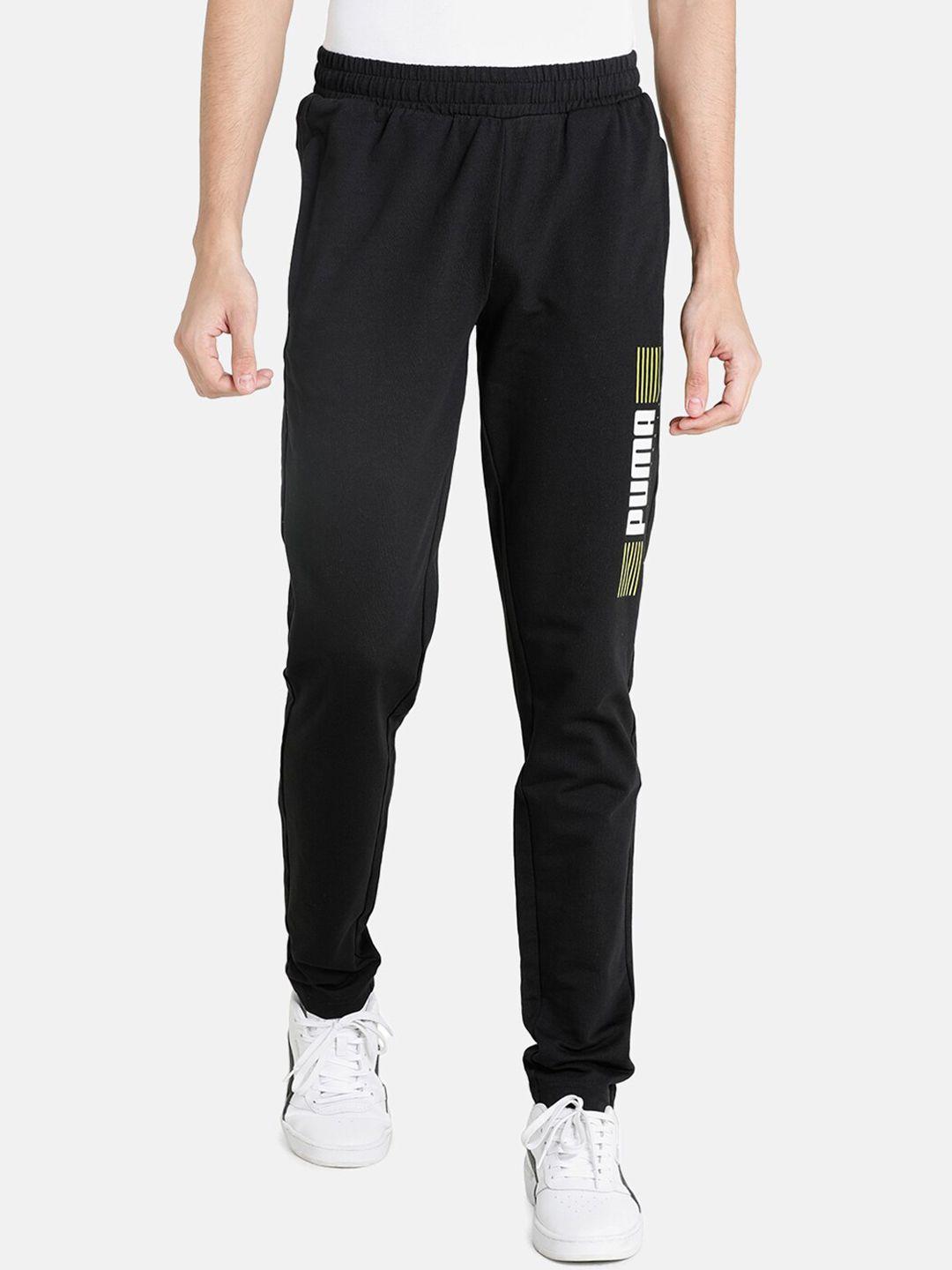 puma men black solid sports track pants