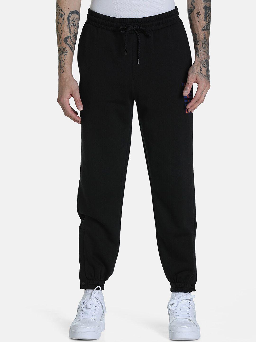 puma men black swxp solid cotton relaxed-fit joggers