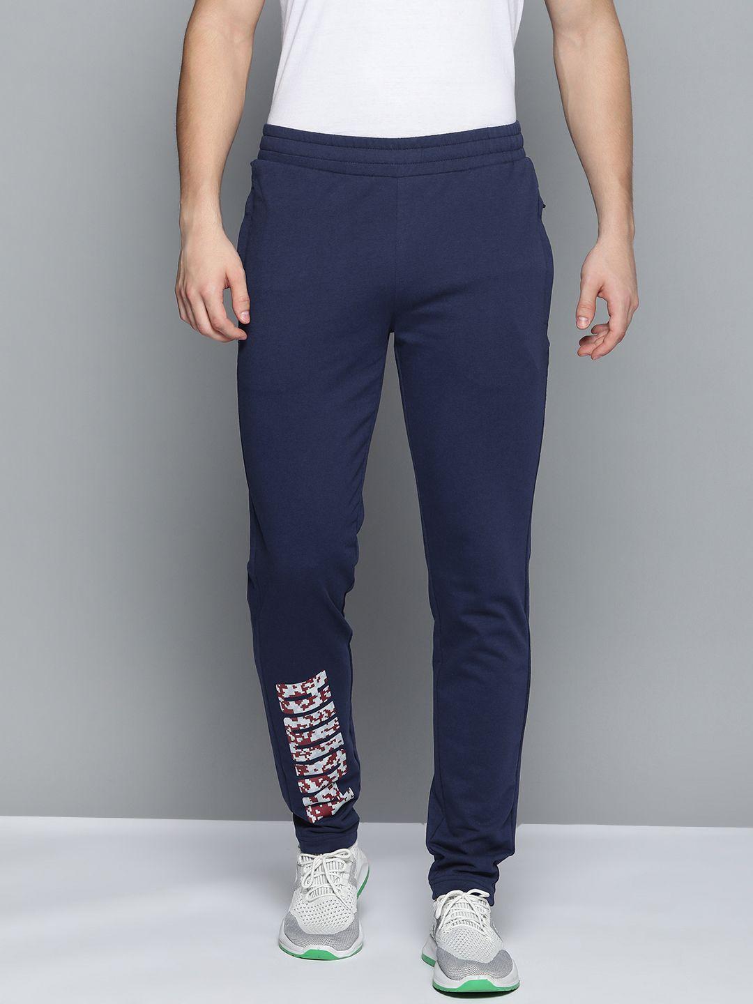 puma men blue graphic printed casual track pants