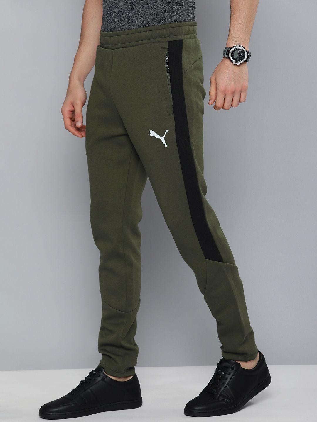 puma men green drycell slim fit evostripe track pants with side stripes
