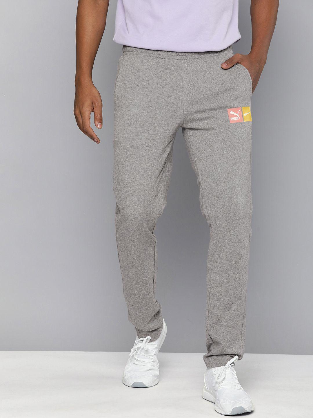 puma men grey melange brand logo printed slim fit graphic track pants