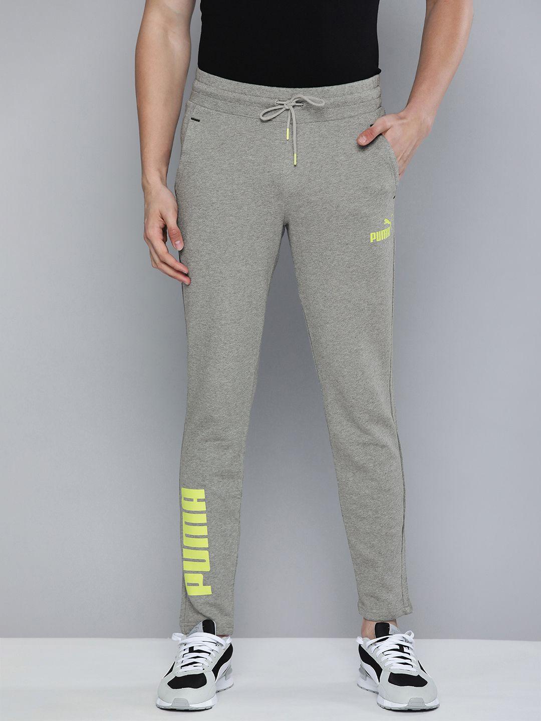 puma men grey typography printed mid rise colourblocked dry cell tapered track pants